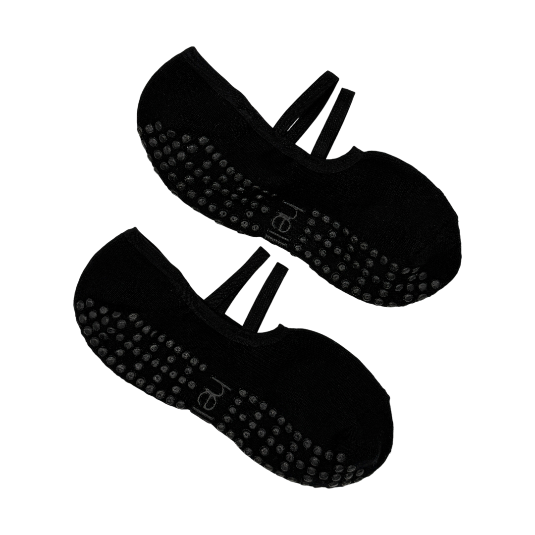 pair of black ballet grip socks lay flat