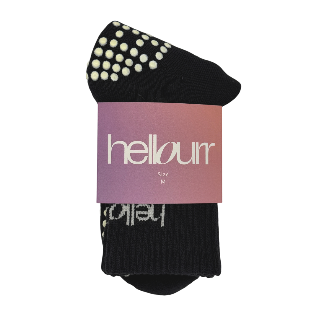 black 'hellourr' midcrew grip socks in packaging