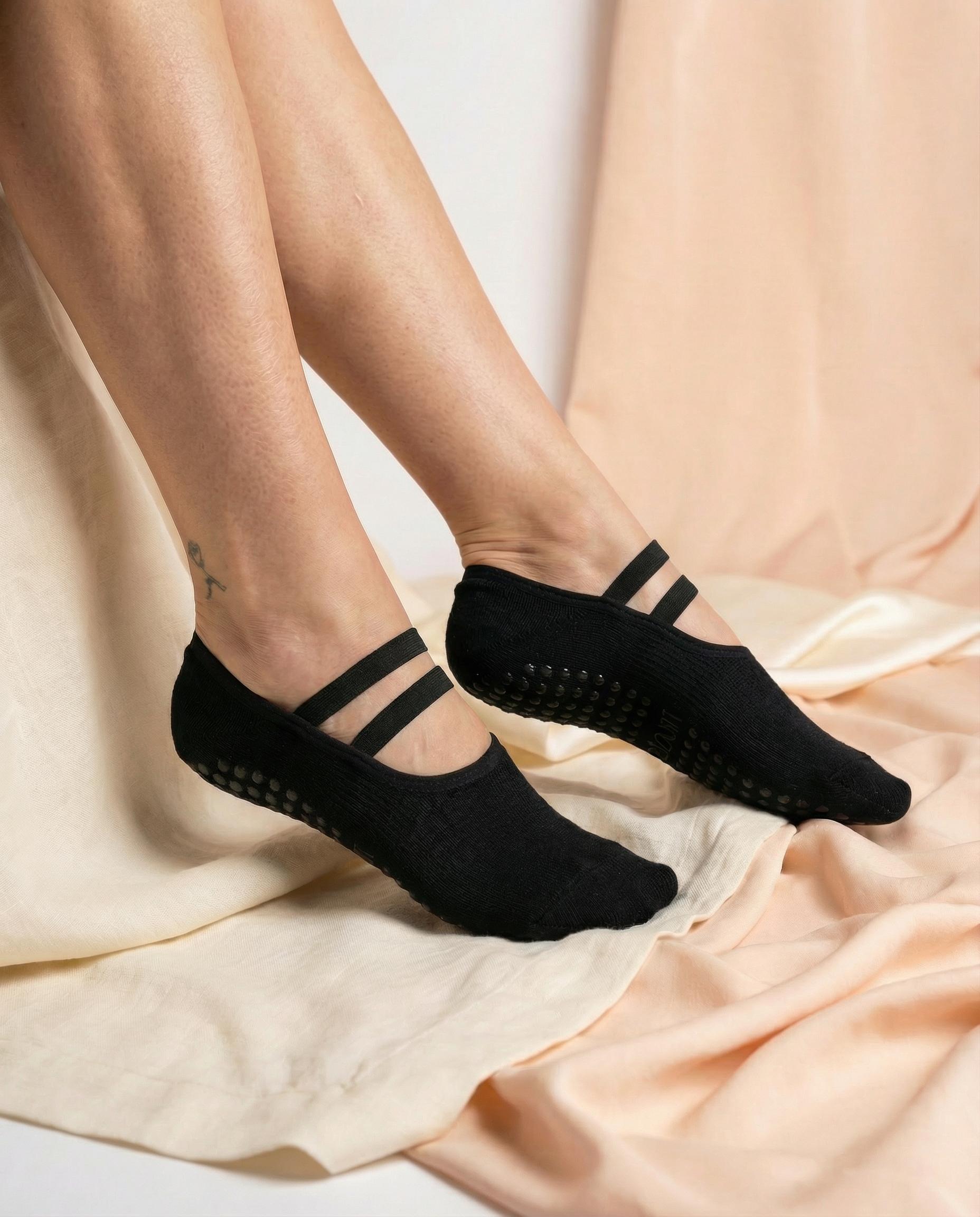 black ballet grip socks on foot