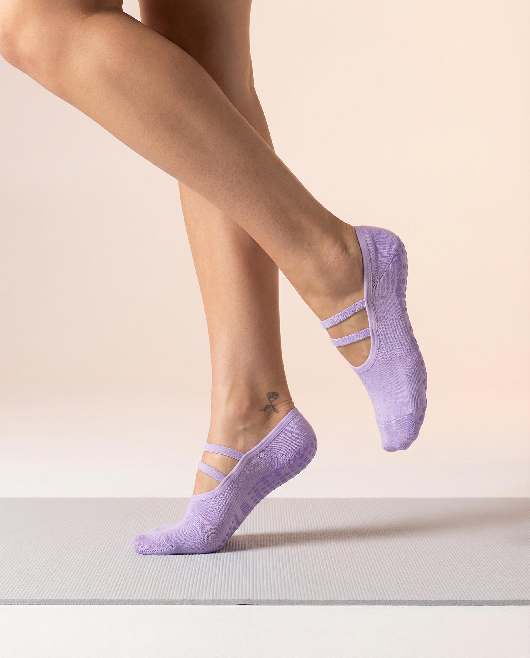 purple ballet grip socks on foot