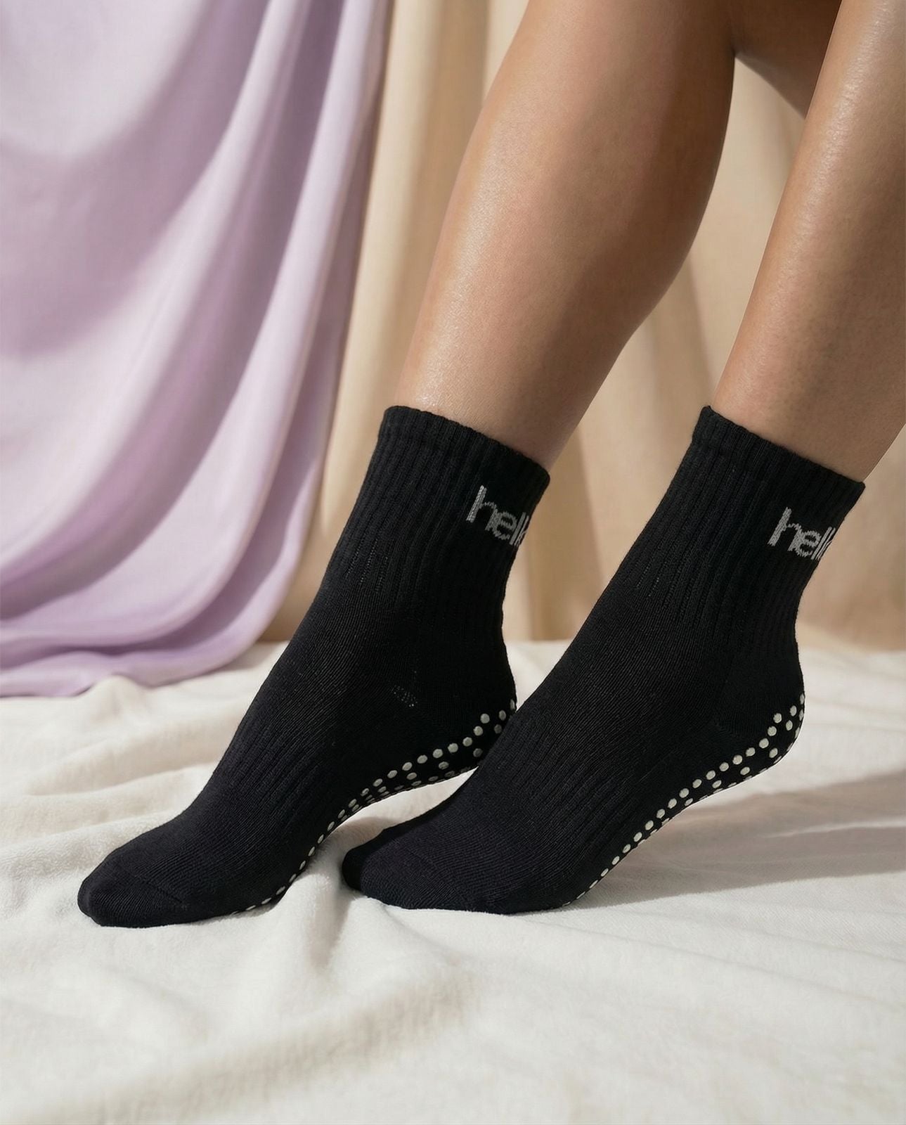 black hellourr pilates socks on foot