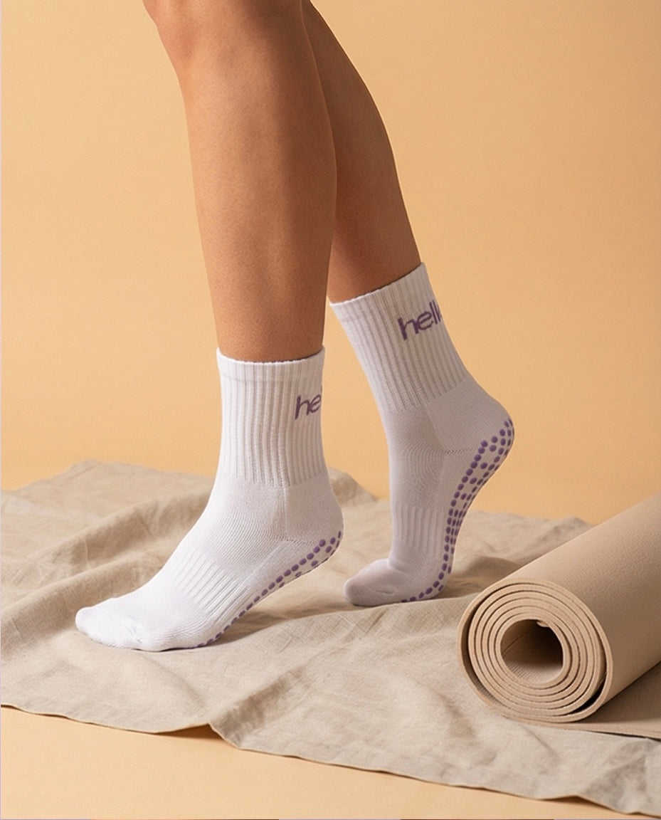 model wearing white purple hellour midcrew grip socks